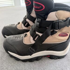 Columbia women's insulated waterproof snow boots featuring a buckle strap